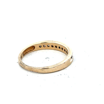 9ct yellow gold diamond ring with 1/4 carat total weight, size O 1/2, featuring a simple and elegant design.