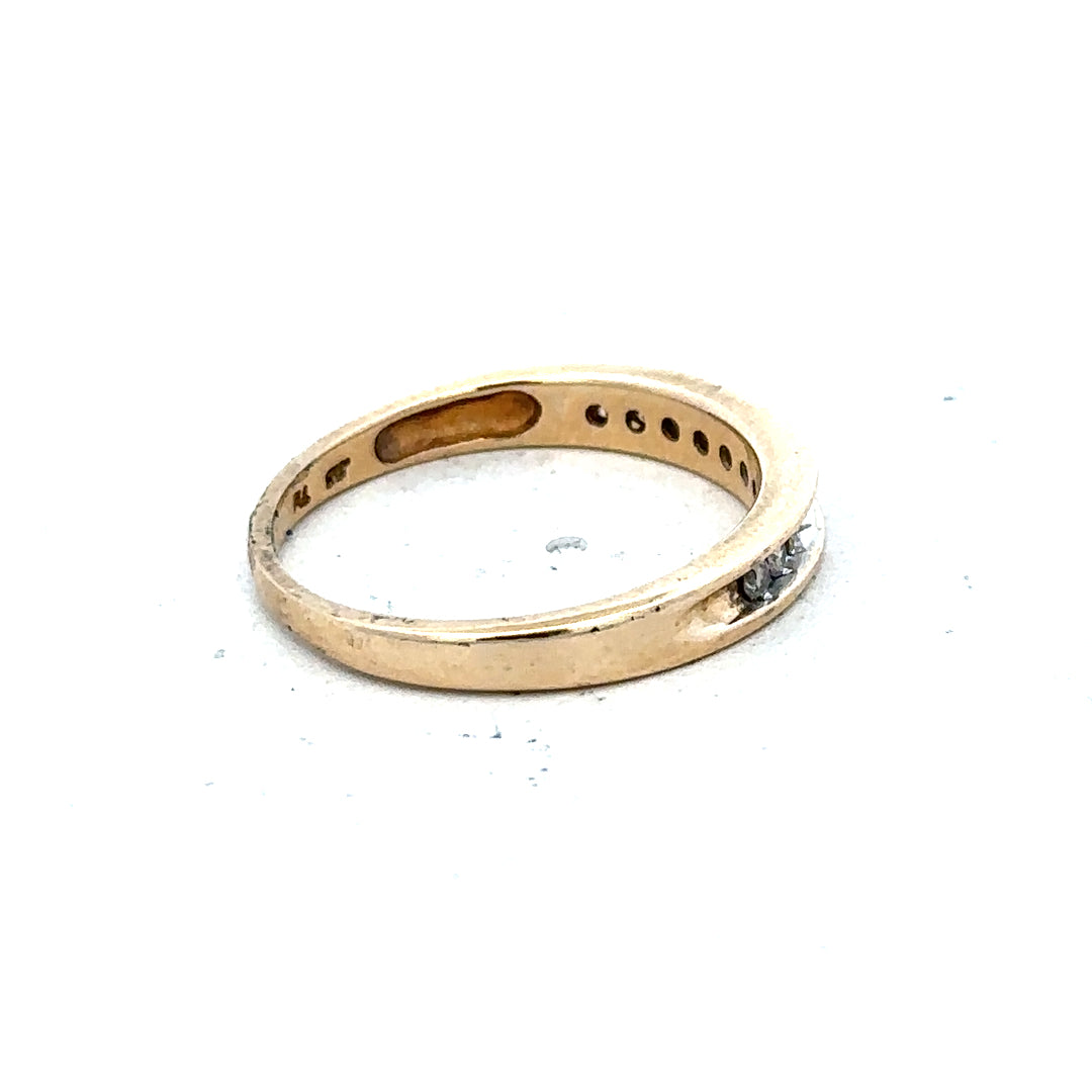 9ct yellow gold diamond ring with 1/4 carat center stone, size O1/2, showcasing a classic design and sparkling diamond detail.
