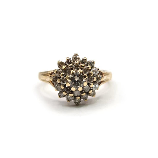 9ct yellow gold diamond cluster ring with 1 carat total weight, featuring a sparkling diamond design and unbranded craftsmanship.