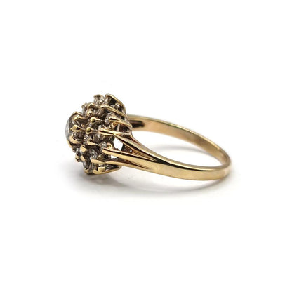 9ct yellow gold diamond cluster ring with 1-carat total weight, featuring a sparkling diamond design on a polished band.