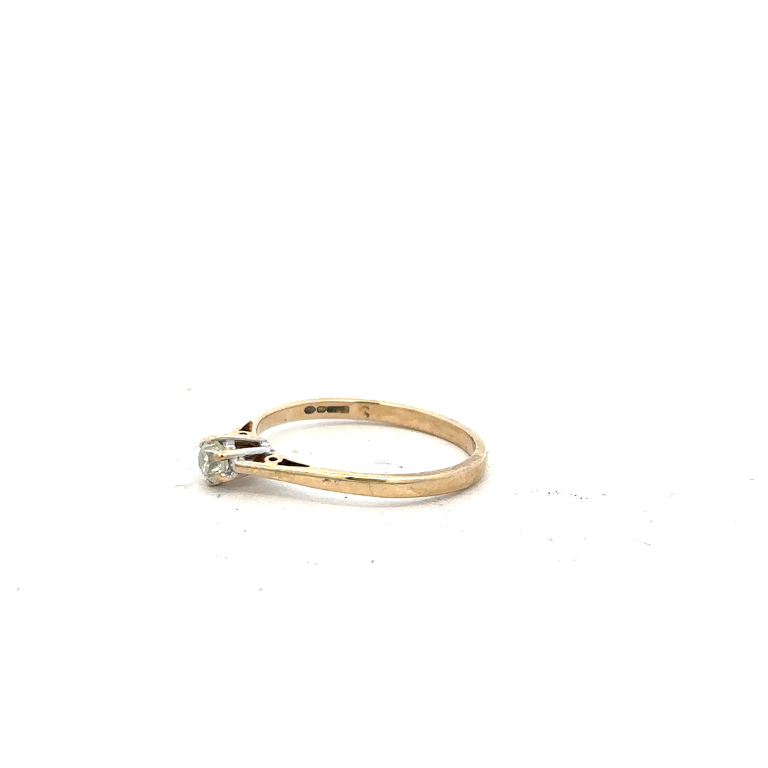 9ct yellow gold diamond ring with 20pts of diamonds in size N1/2, showcasing the elegant band and sparkling stones.