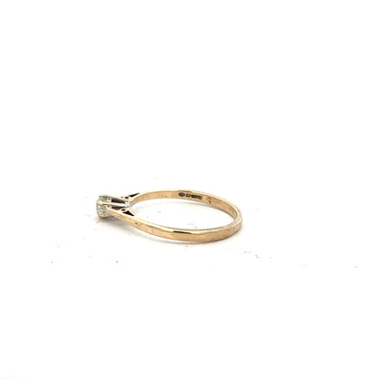 9ct yellow gold diamond ring with 20pts of diamonds in size N1/2, featuring a sleek and elegant design.