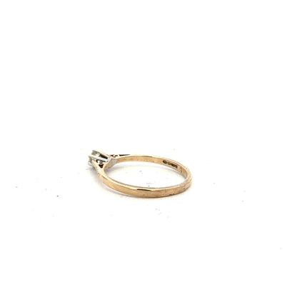 9ct yellow gold diamond ring with 20pts sparkling diamond, size N1/2, featuring a classic unbranded design.