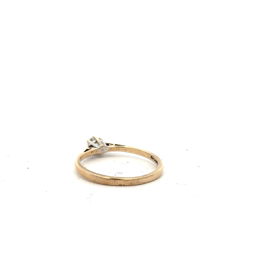 9ct yellow gold diamond ring with 20pts of diamonds in size N1/2, featuring a simple and elegant design.