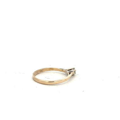 9ct yellow gold diamond ring with 20pts of diamonds, size N1/2, featuring a classic band design.