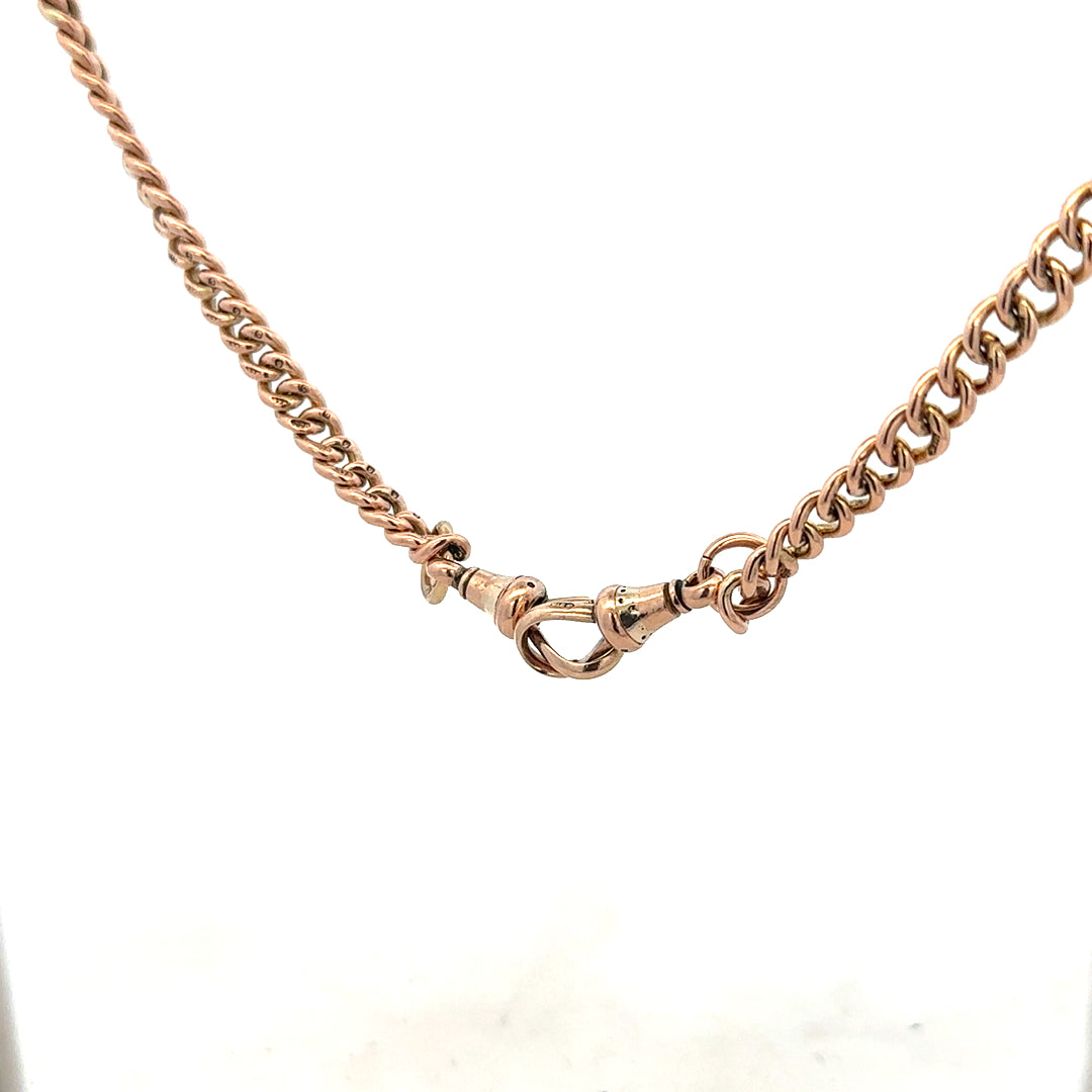 9ct yellow gold Albert chain weighing 45.6g, featuring intricate links and secure clasp, crafted in classic jewelry style.