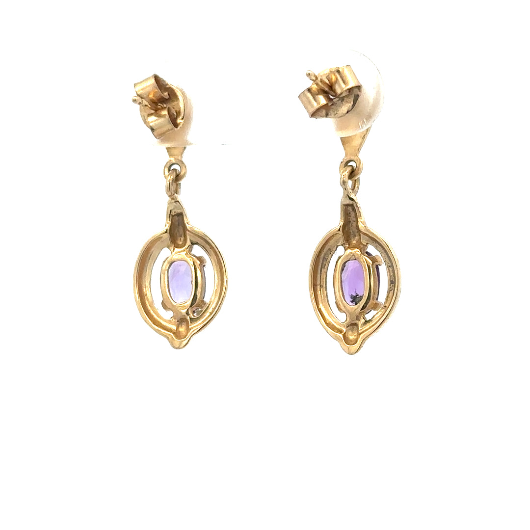 9ct yellow gold amethyst earrings featuring purple gemstones and delicate design, weighing 2.1g, unbranded jewelry.