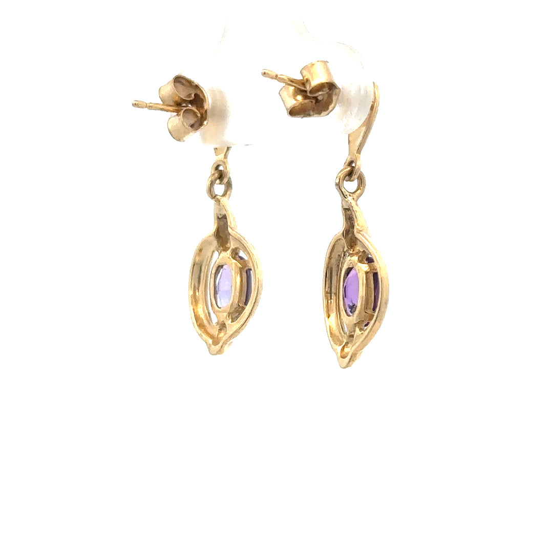 9ct yellow gold amethyst earrings featuring purple gemstones, lightweight design, and a classic stud style.