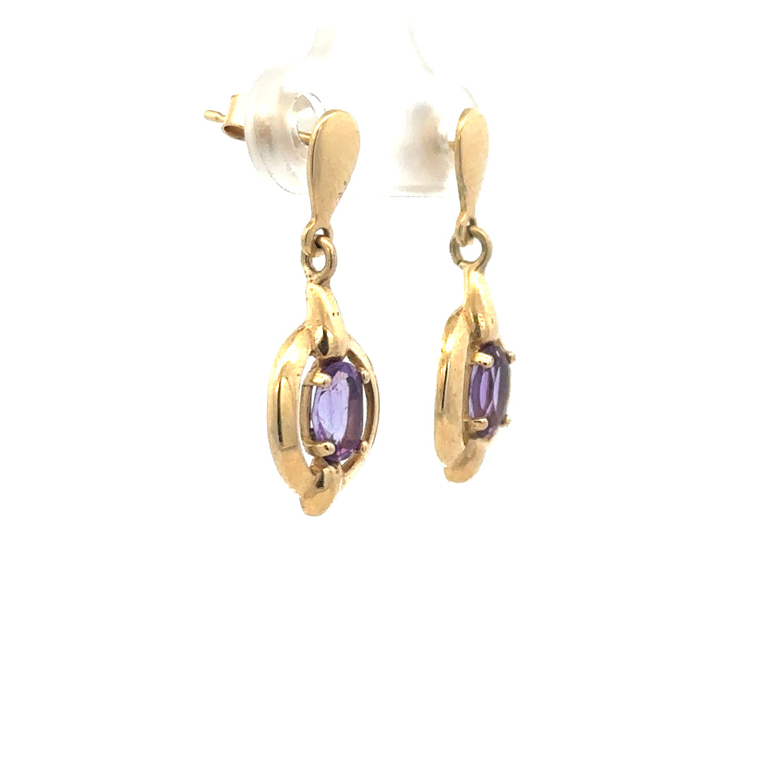9ct yellow gold amethyst earrings with purple gemstones and gold hooks, weighing 2.1g. Elegant jewelry accessory.