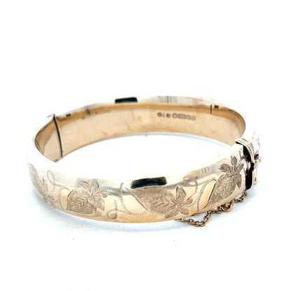 9ct yellow gold bangle with a smooth, polished finish, weighing 20.3g, displayed on a neutral background.