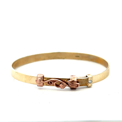 9ct yellow gold bangle weighing 6.3g, unbranded, with a smooth, polished finish shown on a white background.