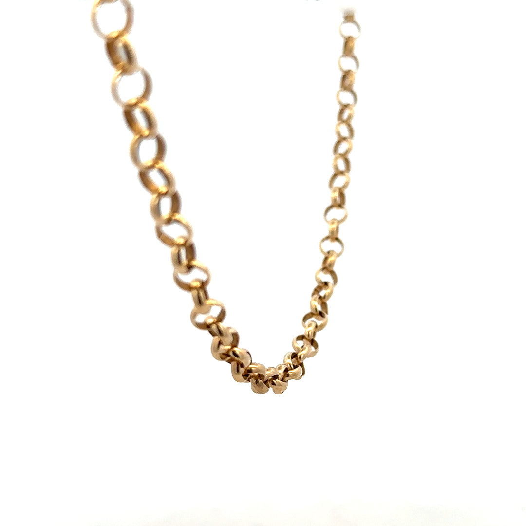 9ct yellow gold belcher chain, unbranded, 21.1g, close-up of the textured chain links on a plain background.