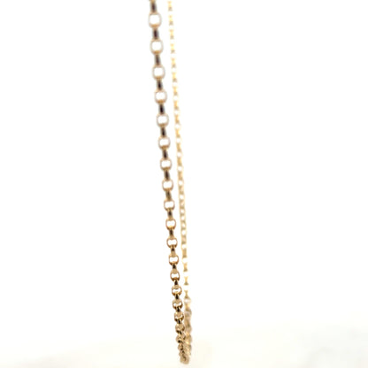 9ct yellow gold belcher chain weighing 5.2g, close-up of the unbranded gold jewelry with interlinked chain links.