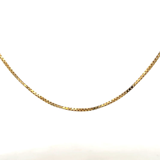 9ct yellow gold box chain weighing 6.4g, unbranded jewelry with a sleek link design, photographed on a white background.