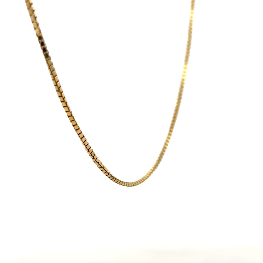 9ct yellow gold box chain weighing 6.4g, unbranded jewelry with a classic design, shown in a close-up image highlighting the chain links.