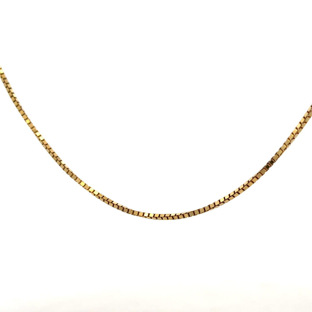 9ct yellow gold box chain weighing 6.4g, unbranded jewelry with a sleek, polished design, visible links and clasp.