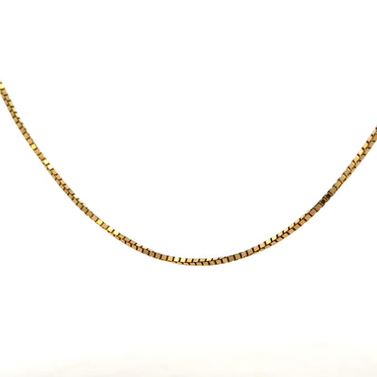9ct yellow gold box chain weighing 6.4g, unbranded jewelry with a sleek, polished design, visible links and clasp.