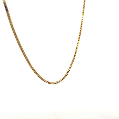 9ct yellow gold box chain weighing 6.4g, featuring a classic rectangular link design, unbranded jewelry for men or women.