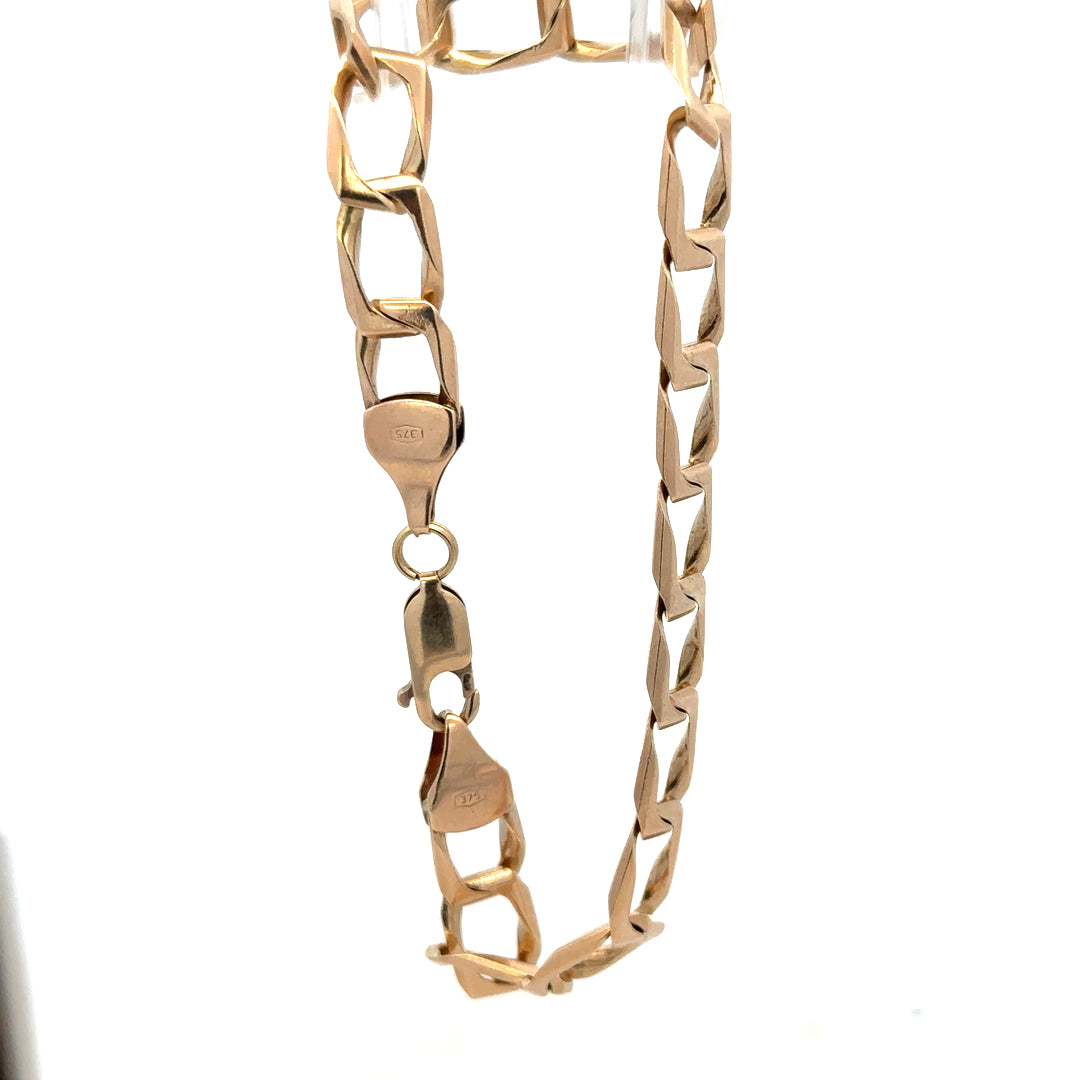 9ct yellow gold bracelet weighing 13.3g, featuring a delicate chain design, unbranded jewelry piece, natural jewelry style