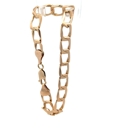 9ct yellow gold bracelet weighing 13.3g, unbranded, with a classic chain design, displayed on a neutral background.