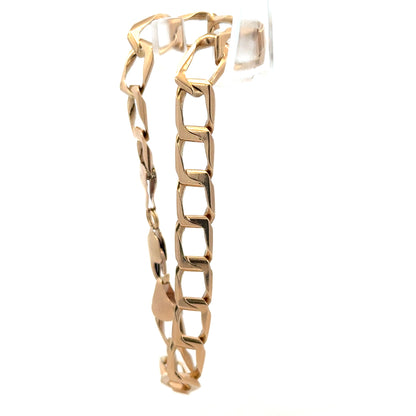 9ct yellow gold bracelet weighing 13.3g, featuring a sleek design, unbranded jewelry piece with fine craftsmanship.