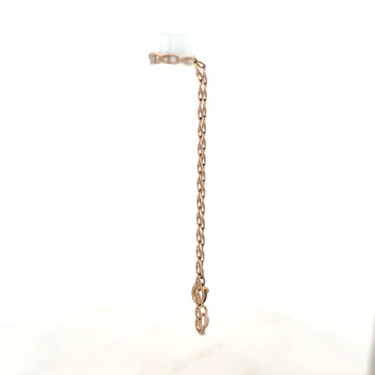 9ct yellow gold bracelet weighing 2.6g, featuring a sleek chain design, unbranded jewelry visible in the image.