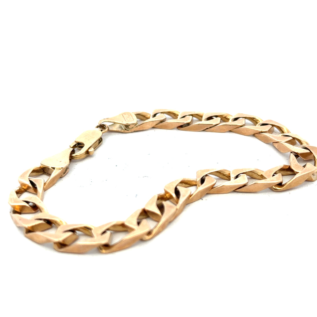 9ct yellow gold bracelet weighing 22.4g, featuring a classic chain design, unbranded jewelry piece on a plain background.