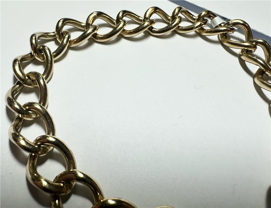 9ct yellow gold bracelet weighing 26.3 grams, unbranded, featuring a classic chain design and smooth finish.