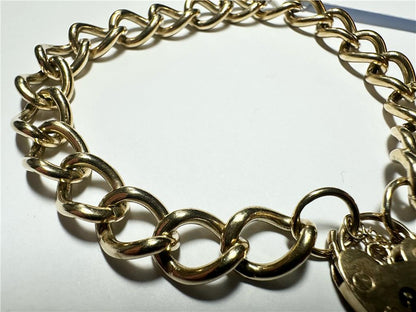 9ct yellow gold bracelet weighing 26.3 grams, unbranded jewelry piece with intricate design and polished finish.