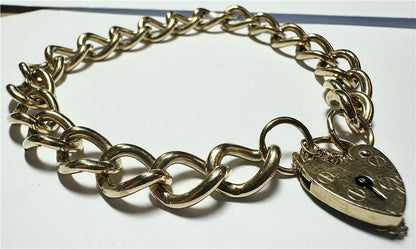 9ct yellow gold bracelet weighing 26.3 grams, unbranded, with a polished finish and linked design, shown in the product image.