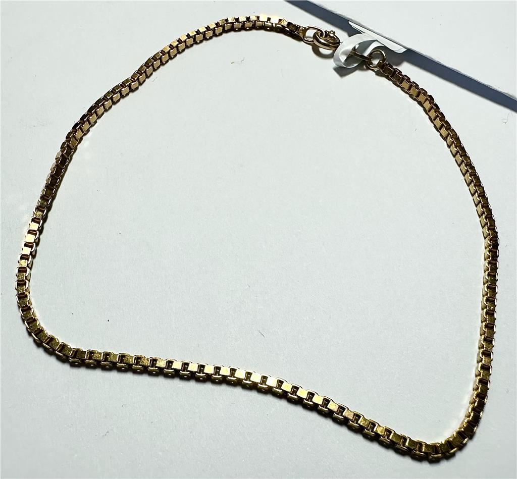 9ct yellow gold bracelet weighing 3.7g, featuring a sleek design and secure clasp, displayed on a white background.