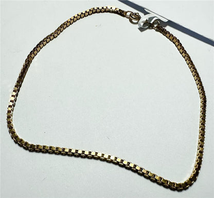 9ct yellow gold bracelet weighing 3.7g, featuring a sleek design and secure clasp, displayed on a white background.
