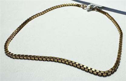 9ct yellow gold bracelet weighing 3.7g with a sleek design, featuring smooth links and a secure clasp.