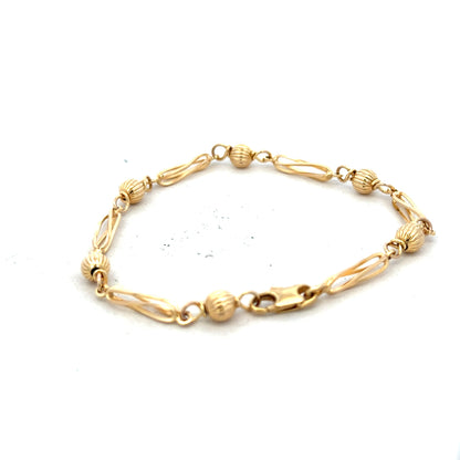 9ct yellow gold bracelet weighing 5.3g, unbranded, with a sleek and simple design, shown on a neutral background.