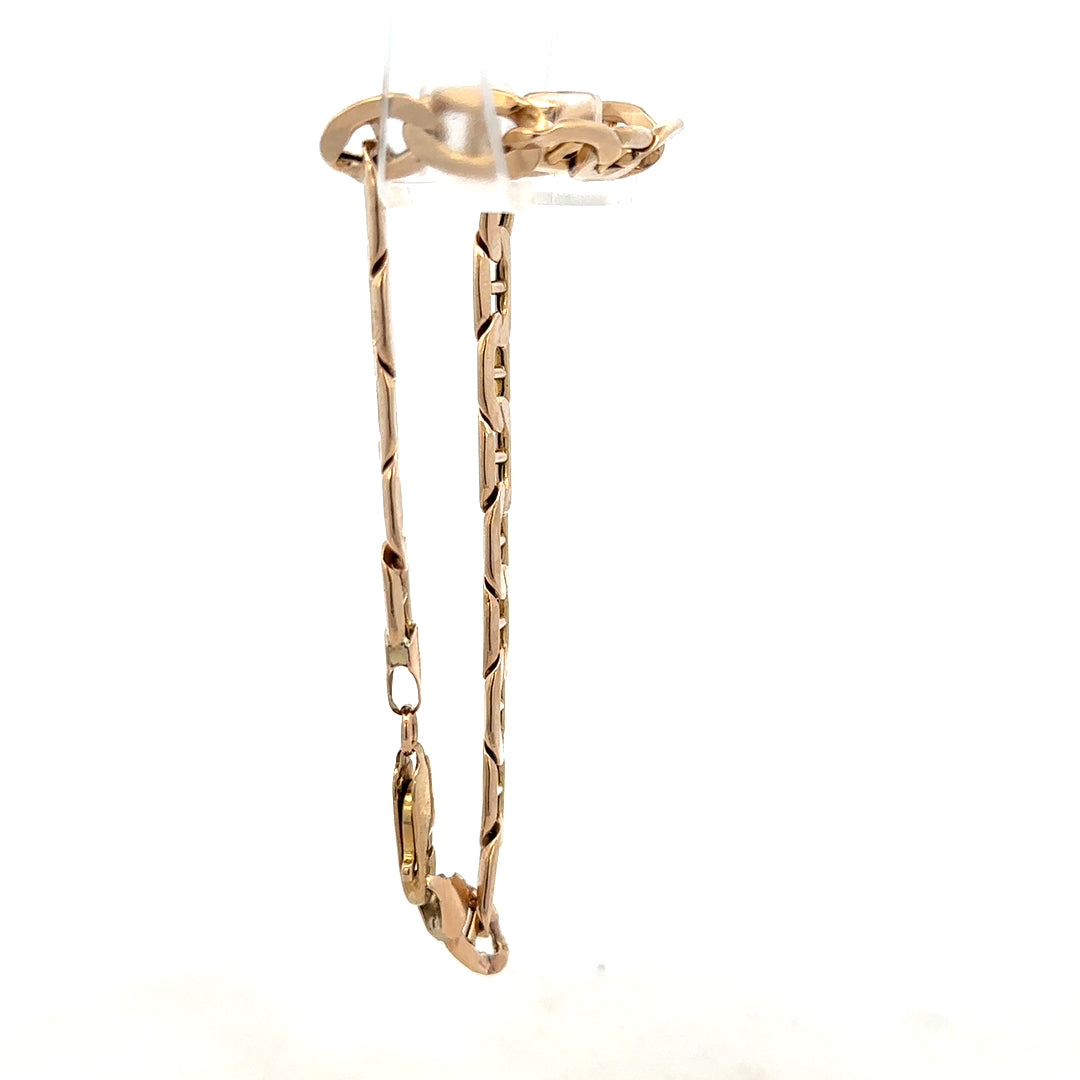 9ct yellow gold bracelet with an elegant link design, weighing 8.6g, featuring a secure clasp and polished finish.