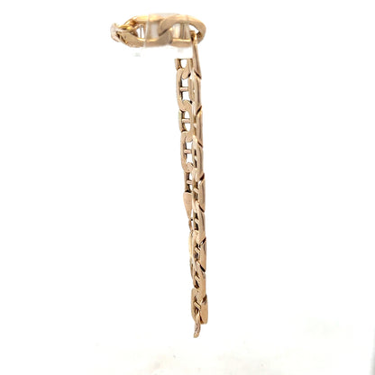 9ct yellow gold bracelet weighing 8.6g, featuring a sleek chain design, unbranded jewelry accessory.
