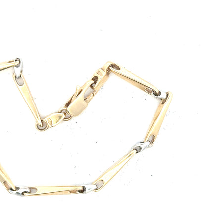 9ct yellow gold bracelet weighing 8.9g, unbranded jewelry piece with intricate design and secure clasp.