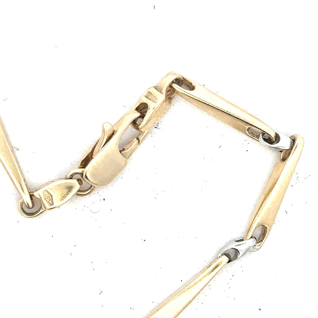 9ct yellow gold bracelet weighing 8.9g, featuring a sleek design with polished links, unbranded jewelry accessory.