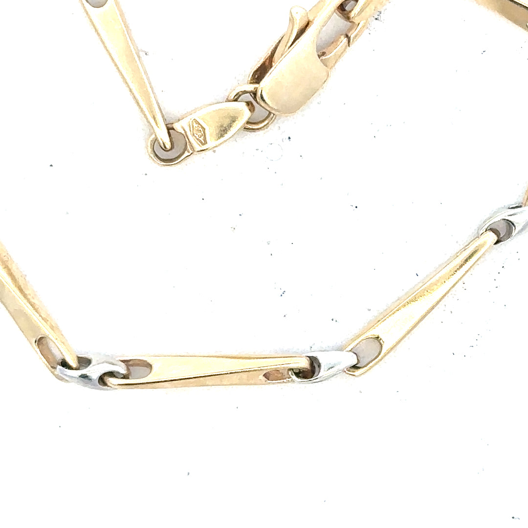 9ct yellow gold bracelet weighing 8.9g, featuring a sleek, polished design and an unbranded style.