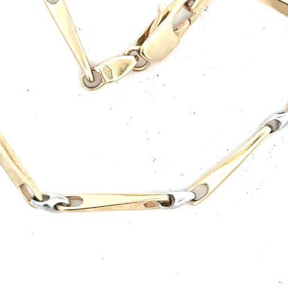 9ct yellow gold bracelet weighing 8.9g, featuring a sleek, polished design and an unbranded style.