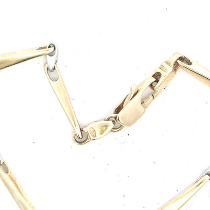 9ct yellow gold bracelet with a delicate chain design, weighing 8.9 grams, crafted in yellow gold.