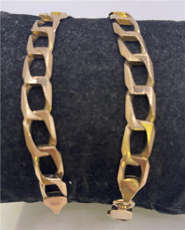 9ct yellow gold bracelet with a sleek, polished finish, featuring a delicate chain design and secure clasp.