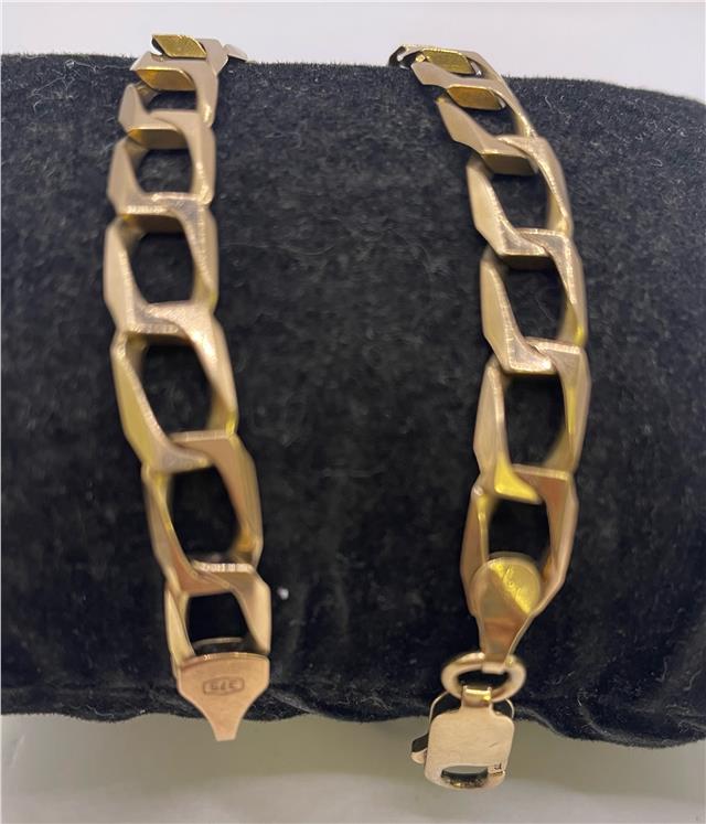 9ct yellow gold bracelet with a delicate chain and clasp, showcasing fine craftsmanship and elegant design.