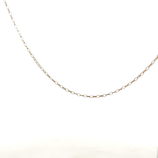 9ct yellow gold chain weighing 0.7g, showcasing a delicate and elegant design, unbranded jewelry piece.