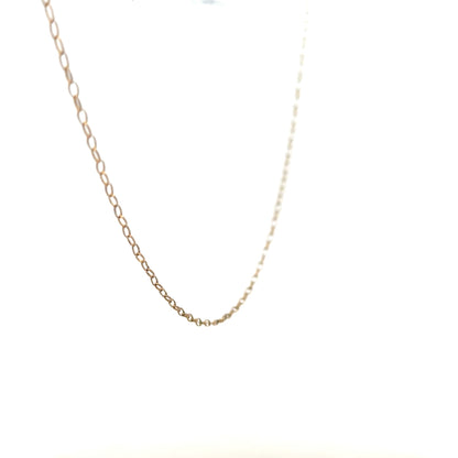 9ct yellow gold chain weighing 0.7g, displayed close-up showing its delicate link design and polished finish.