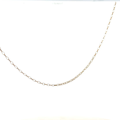 9ct yellow gold chain weighing 0.7g, unbranded, with a delicate link design, displayed on a plain background.