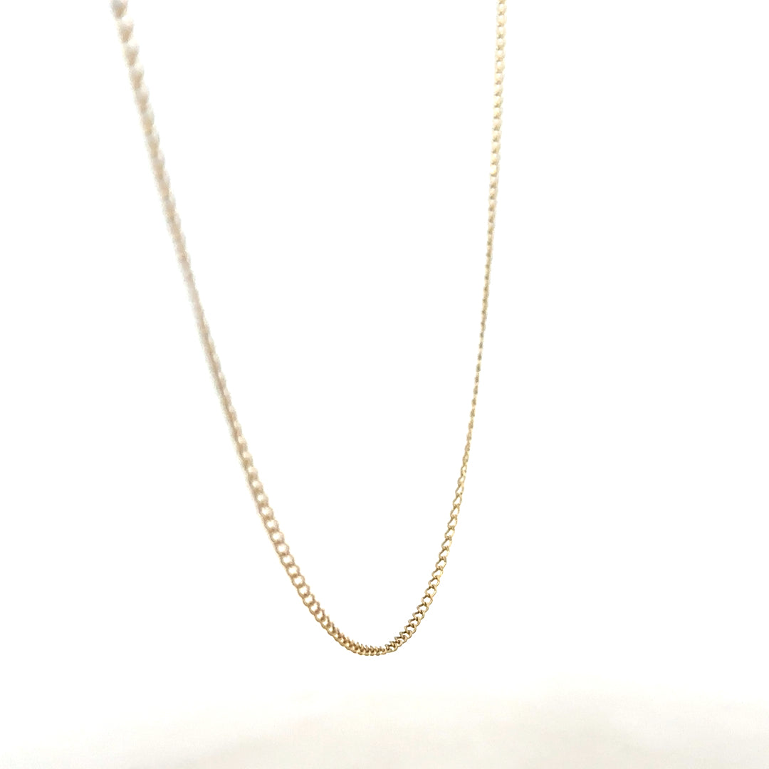 9ct yellow gold chain weighing 1.3g, featuring a delicate and classic design, suitable for everyday wear or layered styling.