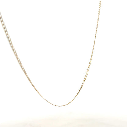 9ct yellow gold chain weighing 1.3g, unbranded jewelry with a delicate link design, shown on a plain background.