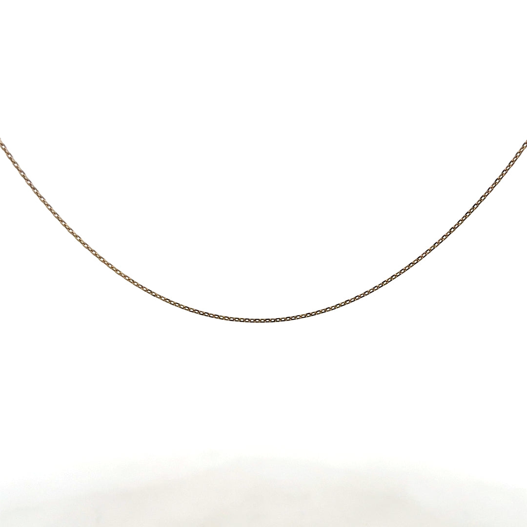 9ct yellow gold chain weighing 1.3g, unbranded, with a classic link design, showcased in a close-up image.