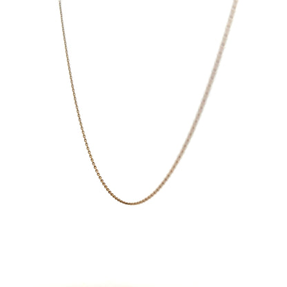 9ct yellow gold chain weighing 1.3g, featuring a classic link design, displayed on a plain background.